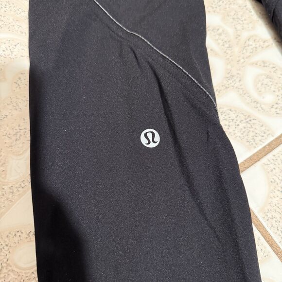 Lululemon Size 4 Reflective Pant Leggings Solid Black Side Pockets Pull On - Picture 4 of 6